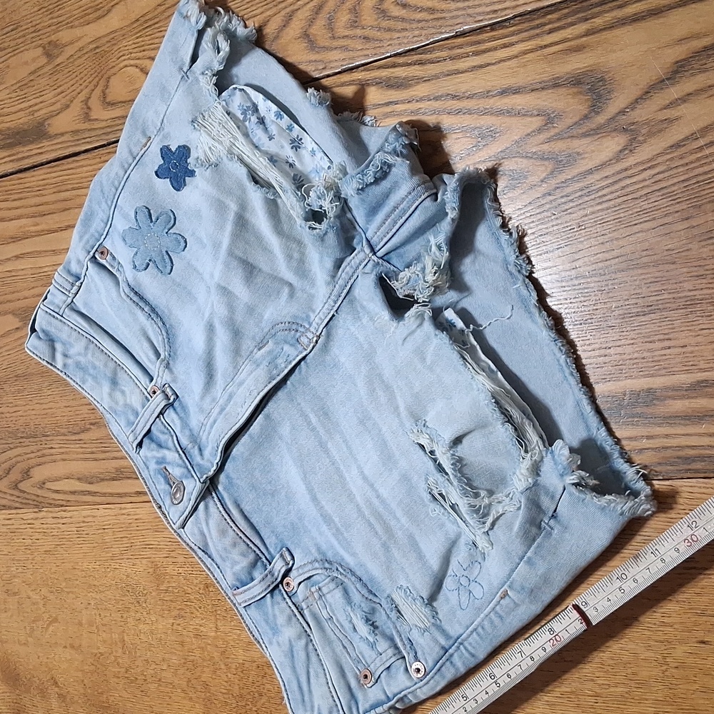 AMERICAN EAGLE JEAN SHORTS WOMENS 10 BLUE HIGH RISE  Used Floral Distressed